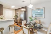 Jackson apartment for rent - a kitchen and dining room with a table and chairs at Reserve of Jackson Apartment Homes, Mississippi, 39211