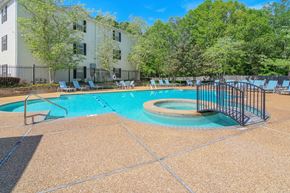 Jackson apartment for rent - our apartments have a resort style pool with a fence around it at Reserve of Jackson Apartment Homes, Mississippi, 39211