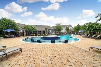 Swimming pool with relaxing sundecks
