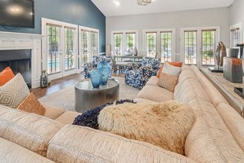 A living room with couches and a fire place