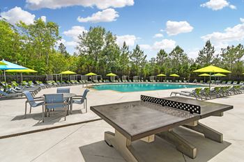 Swimming pool with ping pong table