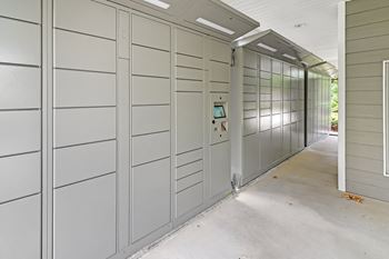 A row of lockers in a hallway of a building