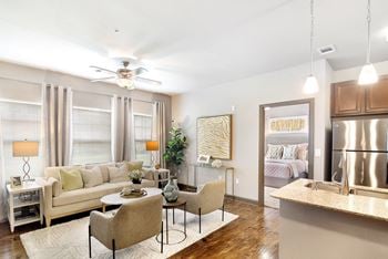 A living room with a couch and a table