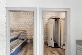 A small room with a boiler room and a furnace