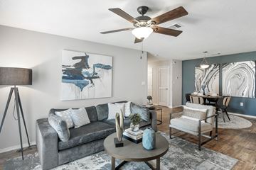 Hattiesburg apartment for rent - a living room with a ceiling fan and a couch