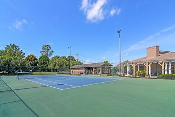Tennis court with lounge area