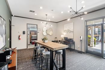 Business center with computer and conference table