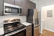 Ridgeland apartment for rent - a kitchen with stainless steel appliances and a refrigerator at Legacy Apartment Homes in Ridgeland, 39157