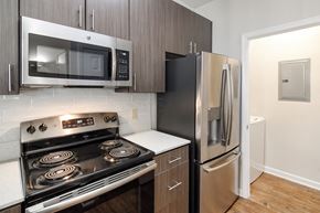 Ridgeland apartment for rent - a kitchen with stainless steel appliances and a refrigerator at Legacy Apartment Homes in Ridgeland, 39157