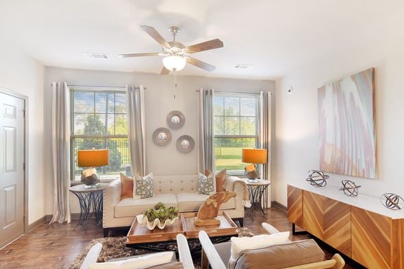 Zachary apartment for rent - a living room with a ceiling fan and a couch at Audubon Park Apartment Homes, LA