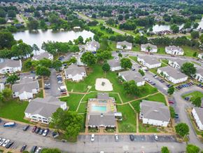 Olive Branch apartment for rent - an aerial view of a neighborhood with a pool in the middle at The Oliver Apartment Homes, Mississippi, 38654