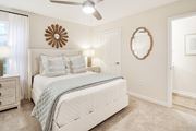 Olive Branch apartment for rent - a bedroom with a white bed and a mirror at The Plantation Apartment Homes, Mississippi, 38654