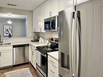 A modern kitchen with stainless steel appliances 