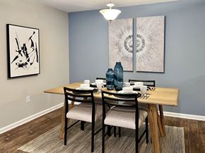 Hattiesburg apartment for rent - our spacious dining room has a large table for 6 at Reserve at Park Place Apartments, Mississippi 39402
