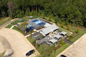 Aerial view of pickleball court and outdoor lounge 