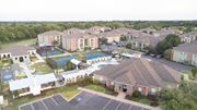 Shreveport apartment for rent - Aerial View of the Community and Swimming Pool at Canebrake Apartment Homes in Louisiana, 71115