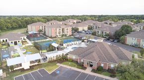 Shreveport apartment for rent - Aerial View of the Community and Swimming Pool at Canebrake Apartment Homes in Louisiana, 71115
