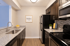 Fairfield apartment for rent - A kitchen with a fridge, stove, and sink.