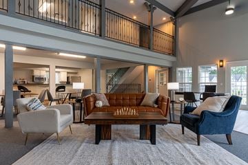 Fairfield apartment for rent - a living room with couches and chairs and a table