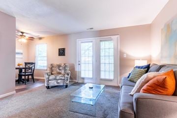 New Albany apartment for rent - a living room with a couch and a glass coffee table