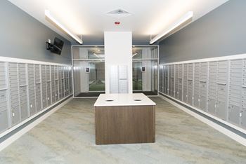 Large mail room with package receiving receiving and parcel 