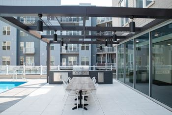 Courtyard with grilling stations and fire pit