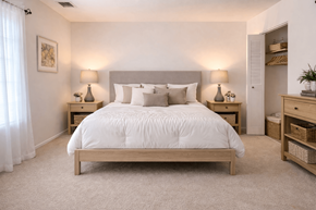 Indianapolis townhouse for rent - A bedroom with a large bed and two nightstands.