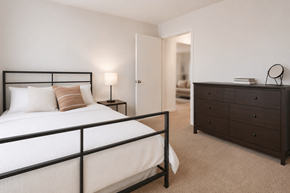Greenwood apartment for rent - A bedroom with a bed, nightstand, and dresser.