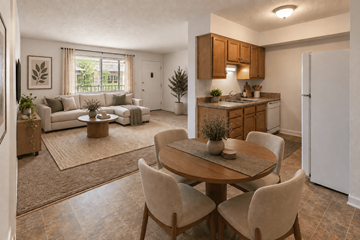 Louisville apartment for rent - A kitchen with a table and chairs in the middle of the room.