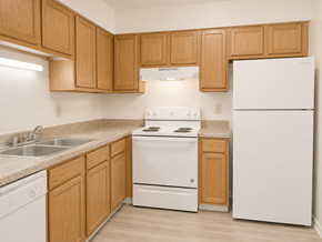 Indianapolis apartment for rent - A kitchen with wooden cabinets and white appliances.
