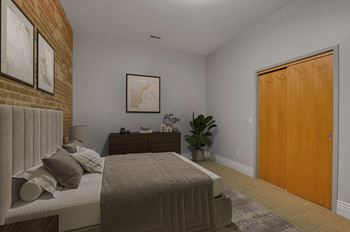 Bedroom with upholstered headboard and wood door