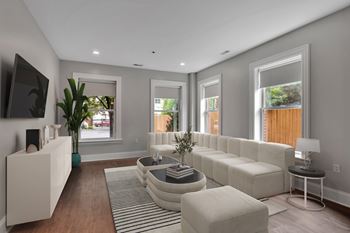 Modern living room with sectional sofa and gray walls