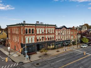 Buffalo apartment for rent - Historic brick buildings at urban street corner at The Granite Works Apartments, Buffalo, NY 14202
