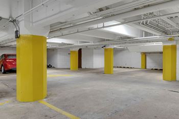 Underground parking garage with yellow support columns