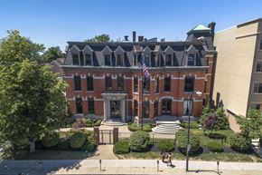 Buffalo apartment for rent - an aerial view of a brick building with an flag at The Knights @ 506 Delaware Apartments, New York, 14202