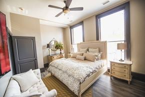 Buffalo apartment for rent - a bedroom with a bed and a ceiling fan at The Knights @ 506 Delaware Apartments, Buffalo, New York