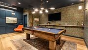 Pittsburgh apartment for rent - a game room with a pool table and a tv at The Commonwealth Building, Pittsburgh, Pennsylvania