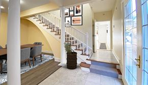 Pittsburgh apartment for rent - a view of the entryway of a house with a staircase in the background
