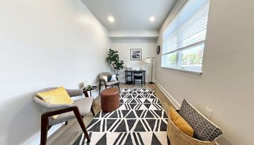 Pittsburgh apartment for rent - a living room with a couch and a chair and a window