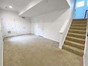 Pittsburgh townhouse for rent - A spacious room with a staircase and built-in closets. at Highland Village, Ross Township, Pittsburgh, PA 15229