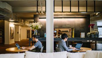 Men sitting at tables