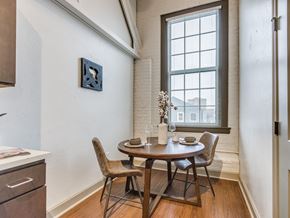Oklahoma City apartment for rent - A dining room with a table set for two.