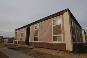 Oklahoma City apartment for rent - a small building with shuttered windows on the side of it