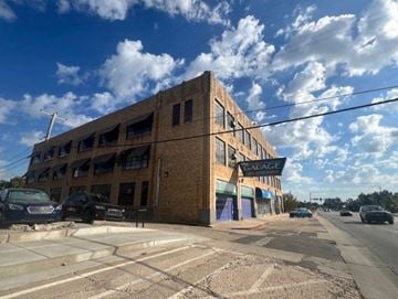 Oklahoma City apartment for rent - A large brick building with the word "garage" on the front.