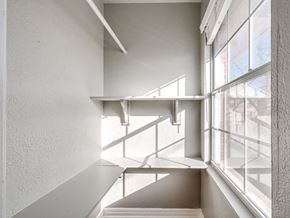 Oklahoma City apartment for rent - a stairwell in a building with a large window and