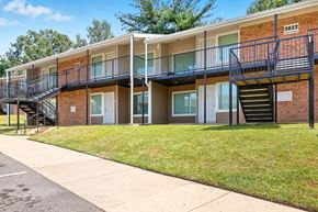 Memphis apartment for rent - Apartment building with balconies and stairs leading to the second floor.