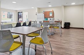 Memphis apartment for rent - A conference room with a long table and chairs.