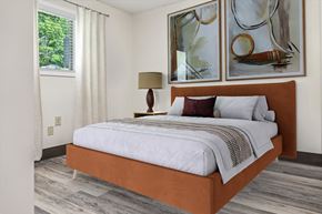 Memphis apartment for rent - A Bedroom With Two Paintings at Hilldale Apartments, Memphis