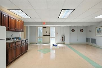 Jackson apartment for rent - A kitchen with a green mat on the floor.