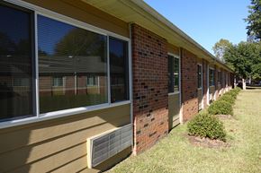 Parsons apartment for rent - a row of windows on the side of a building